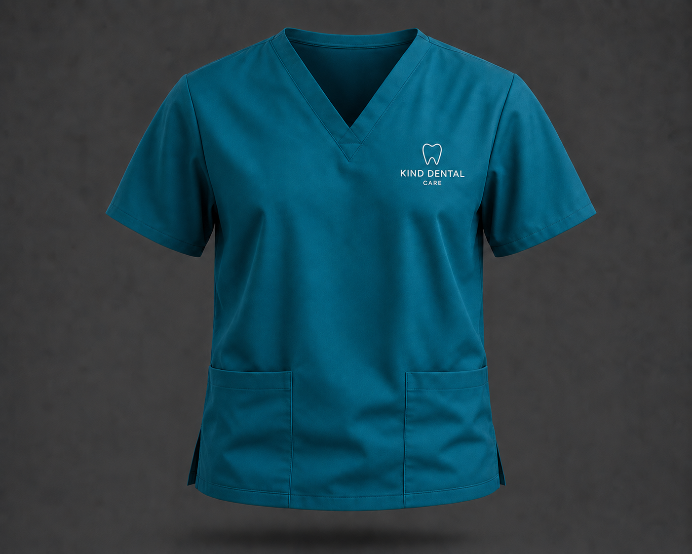 Teal Kind Dental Care branded scrub top