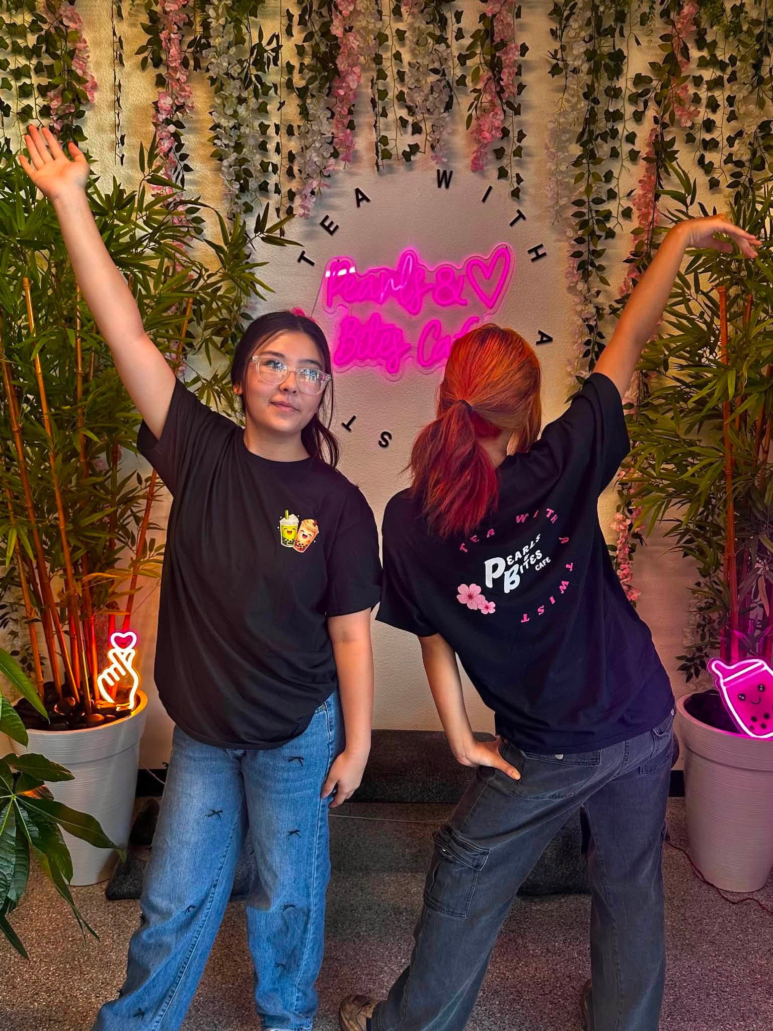 Pearls and Bites team members wearing custom black shirts